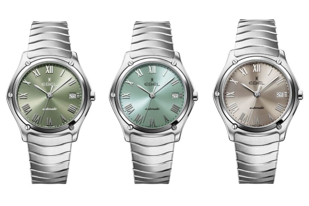 três relógios ebel classic vistos de frente com mostradores verde, azul e cinzento e bracelete metálica integrada na caixa