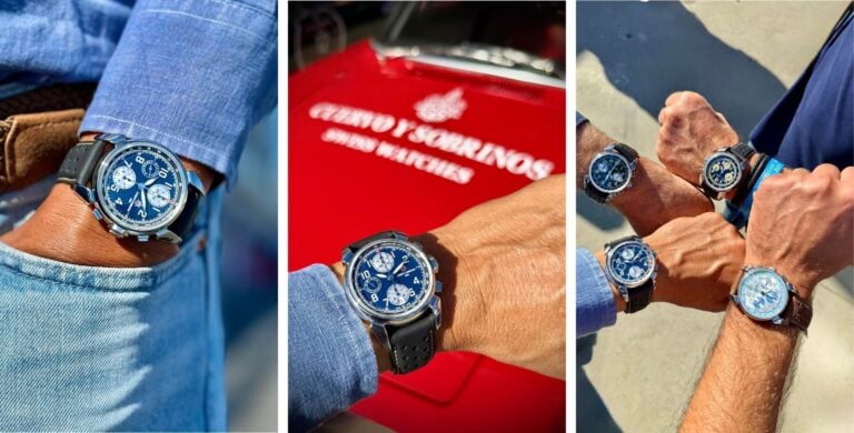 Close-up de um relógio cronógrafo Cuervo y Sobrinos HISTORIC Edurance com mostrador azul e pulseira de pele no pulso de uma pessoa usando camisa jeans.