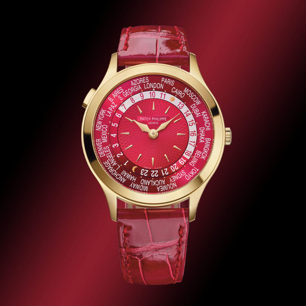 Patek Philippe World Time 7129J-001 Yellow Gold 36mm Ruby Red